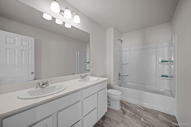 4278 Oak St, Grand Blanc, MI 48439 - full bath featuring double vanity, tub / shower combination, and marble finish flooring