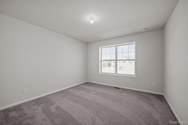 4278 Oak St, Grand Blanc, MI 48439 - carpeted spare room with baseboards