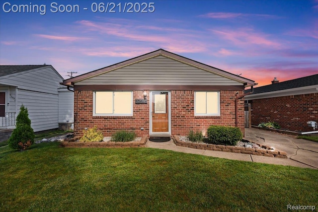 30546 Townley St, Madison Heights, MI 48071 - view of front facade featuring a lawn and brick siding