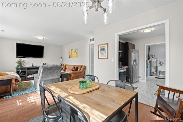 30546 Townley St, Madison Heights, MI 48071 - dining room with a chandelier and water heater