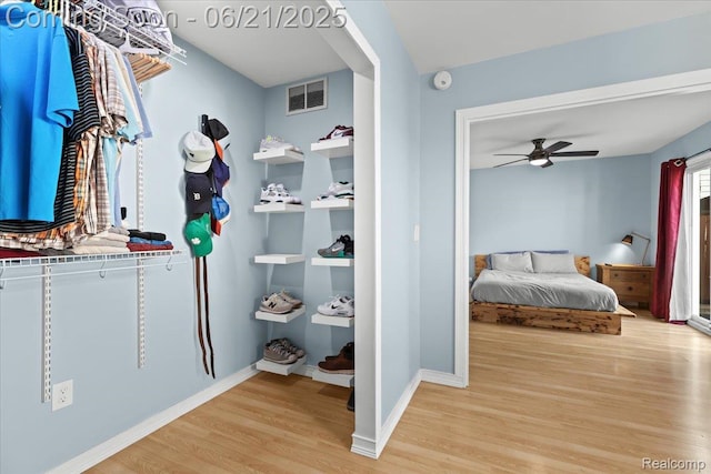 30546 Townley St, Madison Heights, MI 48071 - bedroom with light wood finished floors and a ceiling fan