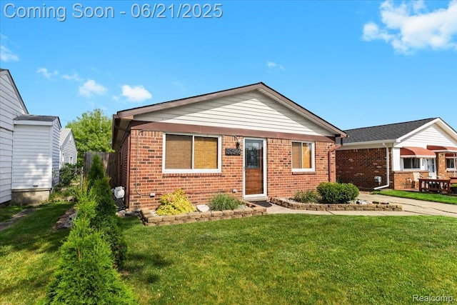 30546 Townley St, Madison Heights, MI 48071 - view of front facade with brick siding and a front yard