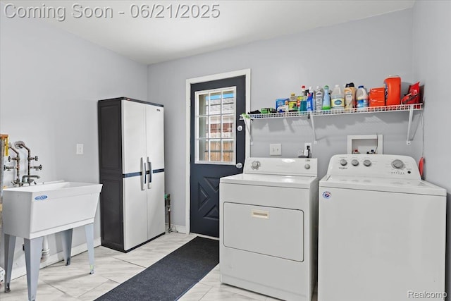 30546 Townley St, Madison Heights, MI 48071 - washroom featuring independent washer and dryer and light marble finish flooring