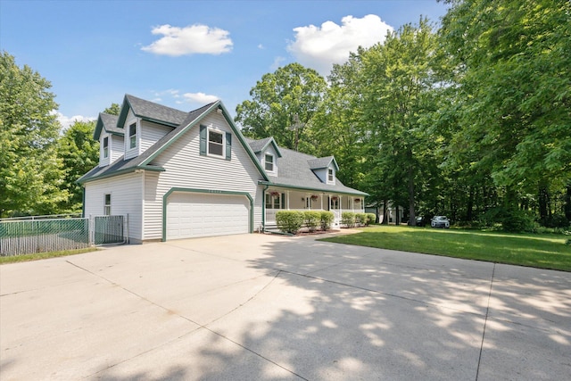 30170 Beeson St, Dowagiac, MI 49047 - cape cod-style house featuring covered porch, driveway, and a garage