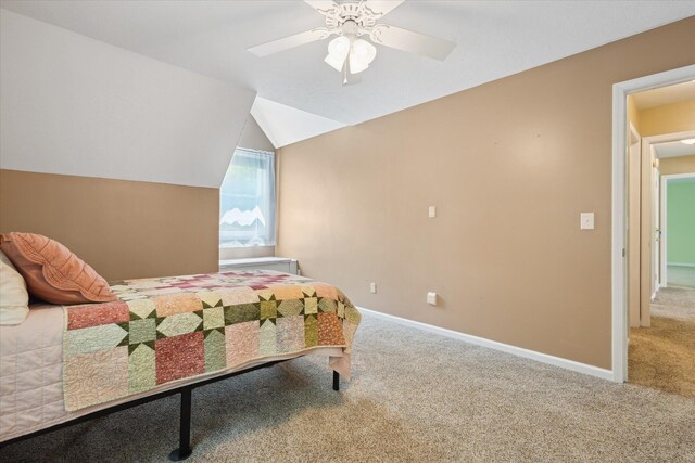 30170 Beeson St, Dowagiac, MI 49047 - carpeted bedroom with vaulted ceiling and ceiling fan