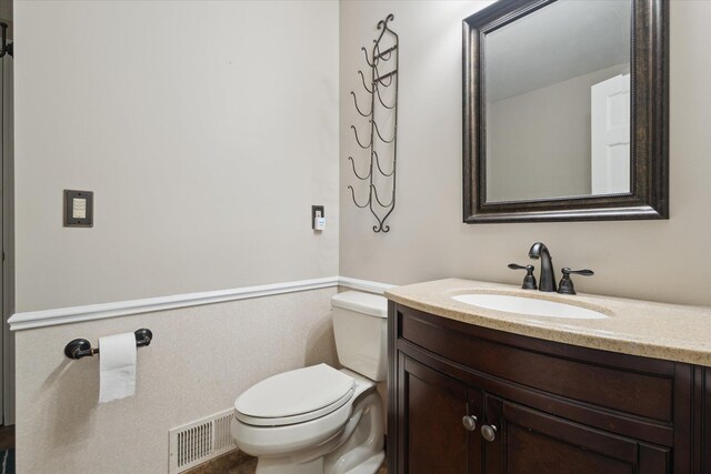 30170 Beeson St, Dowagiac, MI 49047 - half bathroom featuring vanity and toilet