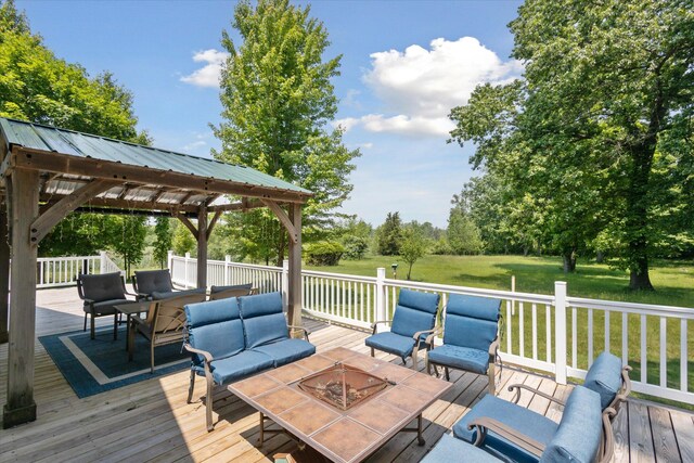 30170 Beeson St, Dowagiac, MI 49047 - wooden deck with an outdoor living space with a fire pit, a gazebo, a lawn, and outdoor dining area