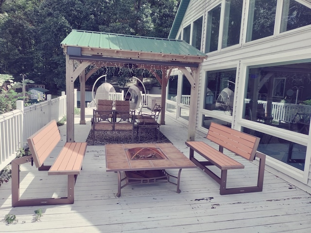 30170 Beeson St, Dowagiac, MI 49047 - wooden deck with an outdoor fire pit and outdoor dining area