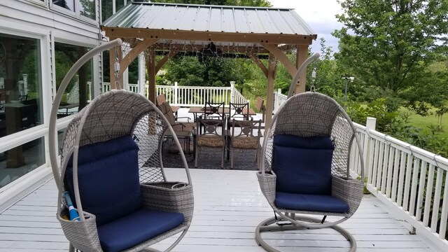 30170 Beeson St, Dowagiac, MI 49047 - wooden terrace with outdoor dining area and a gazebo