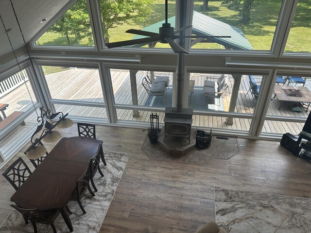 30170 Beeson St, Dowagiac, MI 49047 - sunroom / solarium featuring a wood stove and wood finished floors