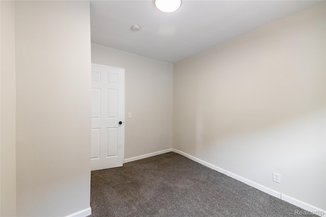 3820 17th St, Grosse Ile, MI 48192 - spare room with dark carpet and a smoke detector