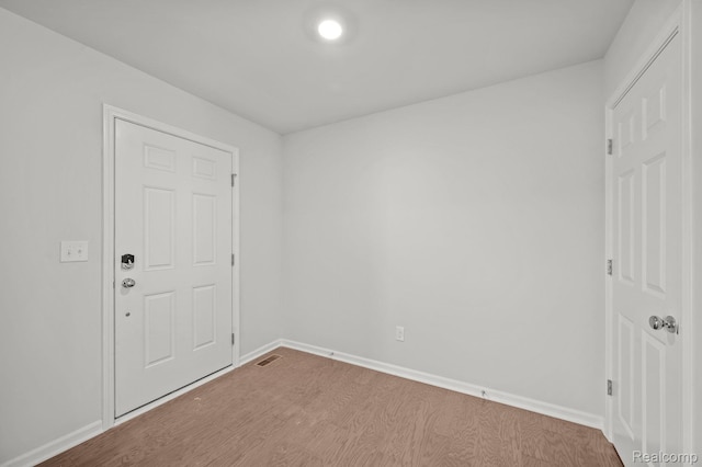 4286 Oak St, Grand Blanc, MI 48439 - unfurnished room with baseboards and wood finished floors