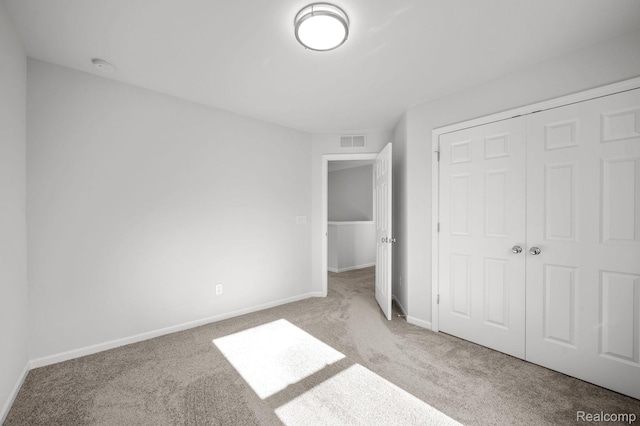4286 Oak St, Grand Blanc, MI 48439 - unfurnished bedroom featuring carpet and a closet