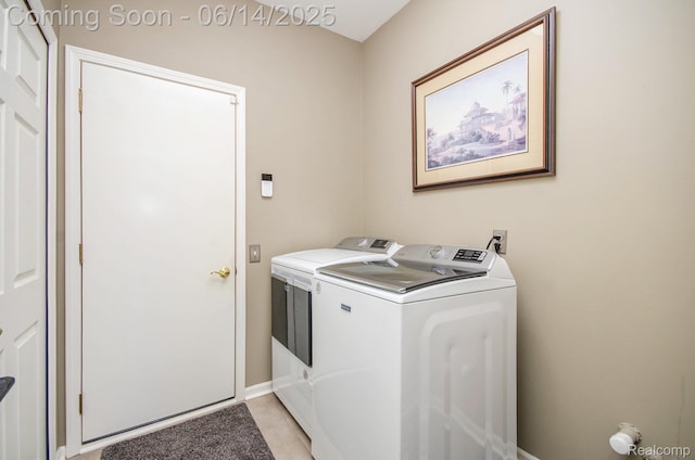 3839 Springwood Ct, Auburn Hills, MI 48326 - laundry room featuring washing machine and clothes dryer and baseboards