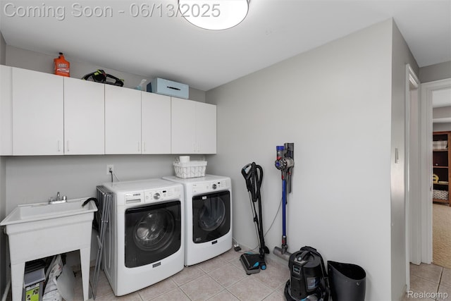 24960 S Cromwell Dr, Franklin, MI 48025 - laundry room featuring cabinet space, separate washer and dryer, and light tile patterned flooring
