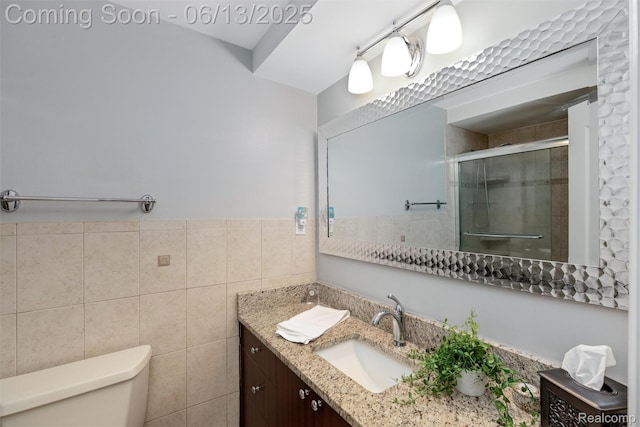 24960 S Cromwell Dr, Franklin, MI 48025 - bathroom featuring vanity, a stall shower, and tile walls