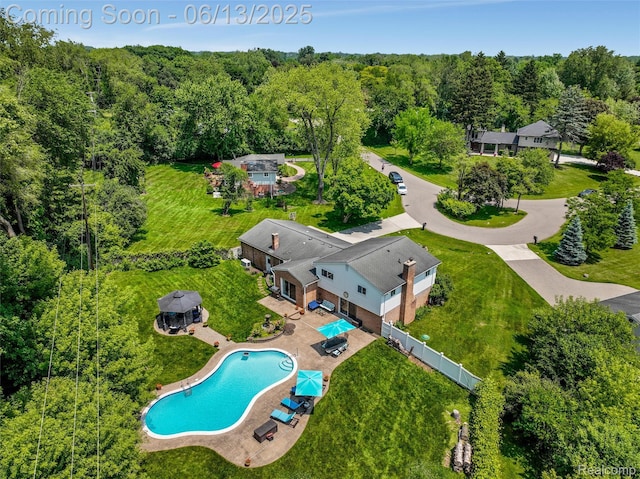 24960 S Cromwell Dr, Franklin, MI 48025 - drone / aerial view of a pool and a heavily wooded area