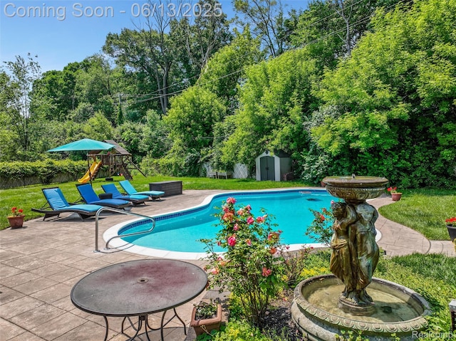 24960 S Cromwell Dr, Franklin, MI 48025 - swimming pool with a shed, a playground, a patio, a yard, and view of wooded area