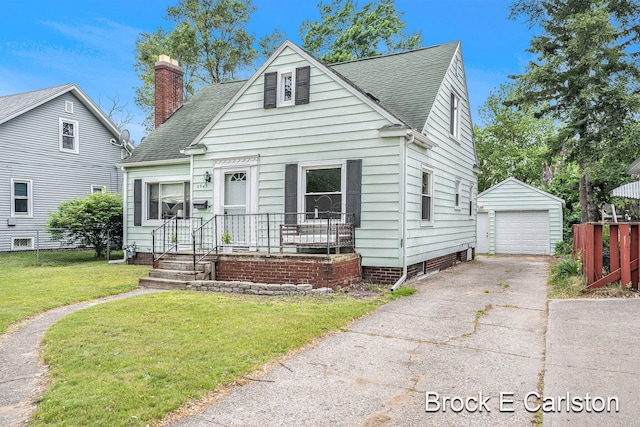 2945 Roosevelt Rd, Roosevelt Park, MI 49441 - bungalow-style house with driveway, an outdoor structure, a detached garage, roof with shingles, and a chimney