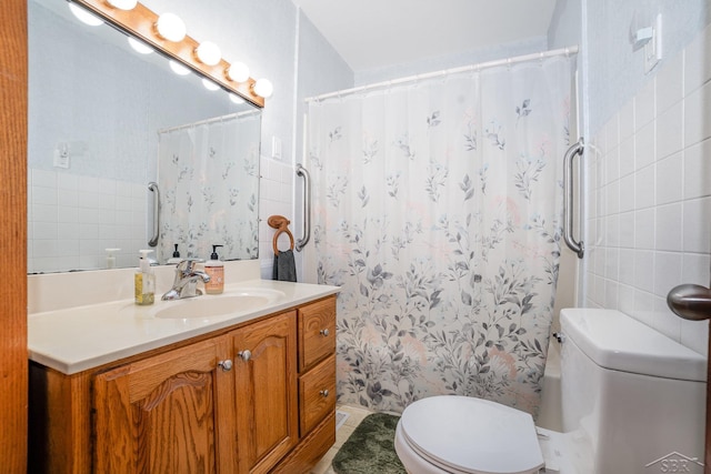 441 Hillcrest Dr, Lake, MI 48632 - bathroom featuring vanity, a shower with curtain, tile walls, and tile patterned flooring