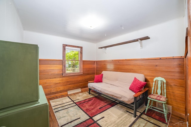 441 Hillcrest Dr, Lake, MI 48632 - living area featuring wood walls, a wainscoted wall, and wood finished floors