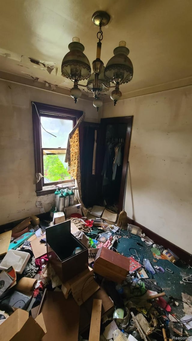 193 Division St, River Rouge, MI 48218 - miscellaneous room featuring a chandelier