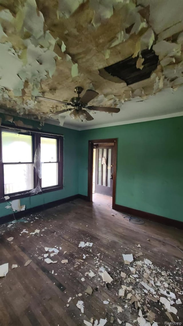 193 Division St, River Rouge, MI 48218 - spare room featuring wood finished floors and crown molding