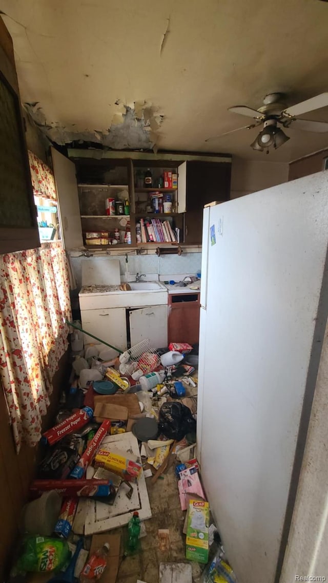 193 Division St, River Rouge, MI 48218 - kitchen featuring freestanding refrigerator, a ceiling fan, and open shelves