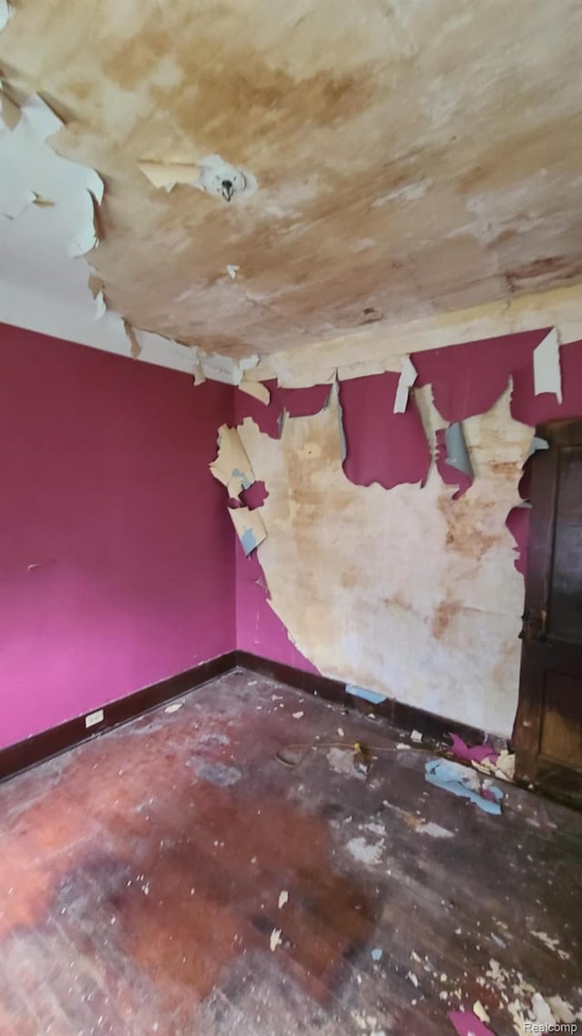 193 Division St, River Rouge, MI 48218 - spare room featuring wood finished floors