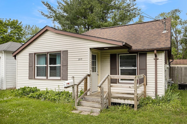 3515 Adams St, Kalamazoo, MI 49008 - view of front of house featuring a shingled roof and a deck