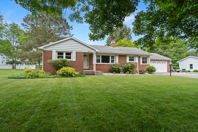 833 S Lansing St, Mason, MI 48854 - ranch-style home with brick siding, a chimney, and driveway