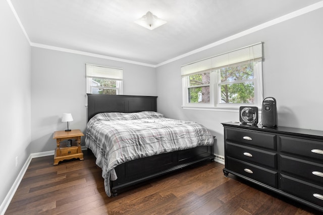 833 S Lansing St, Mason, MI 48854 - bedroom featuring crown molding and dark wood-style flooring