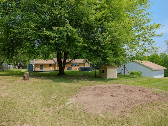 7061 W N Ave, Kalamazoo, MI 49009 - view of grassy yard with a shed