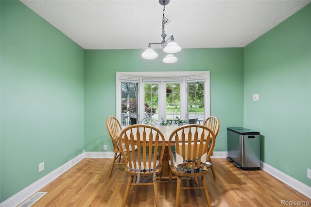 1614 Colorado St, Marysville, MI 48040 - dining space with a chandelier and wood finished floors