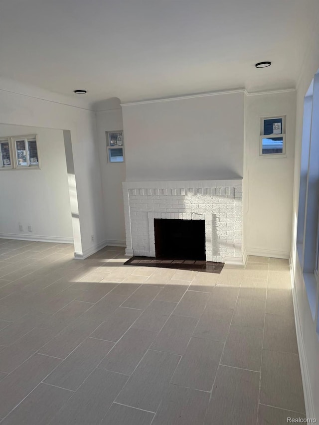 4707 Buckingham Ave, Detroit, MI 48224 - unfurnished living room with a fireplace and crown molding