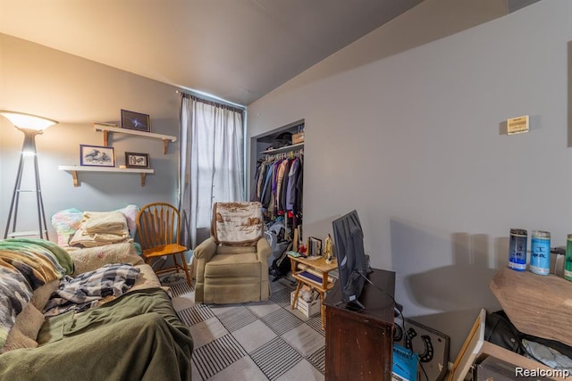910 Monroe St, Carleton, MI 48117 - bedroom featuring lofted ceiling and a closet