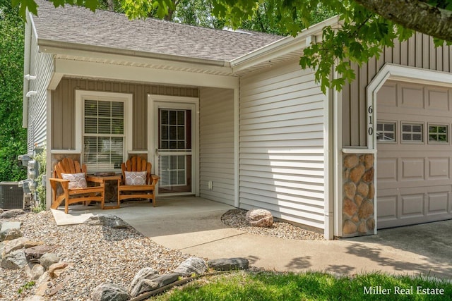 610 Riverwalk St Unit 18, Hastings, MI 49058 - view of outbuilding with a garage