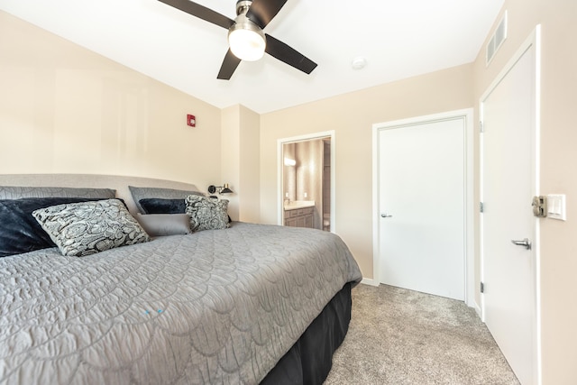 293 N 2nd St Unit 201, Brighton, MI 48116 - bedroom featuring light carpet, ceiling fan, and ensuite bath