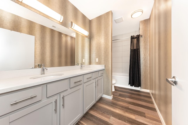 293 N 2nd St Unit 201, Brighton, MI 48116 - full bath featuring double vanity, wood finished floors, and shower / bathtub combination with curtain