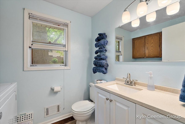 69 Cheyenne Ave, Holland, MI 49424 - bathroom with vanity and washing machine and clothes dryer