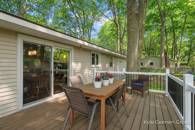 69 Cheyenne Ave, Holland, MI 49424 - wooden deck featuring outdoor dining space