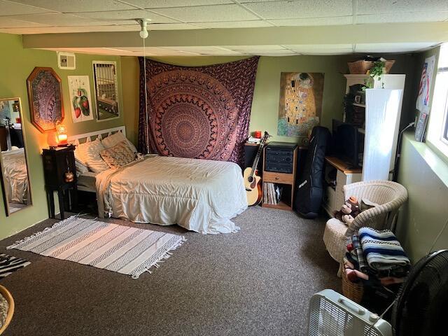 3052 143rd Ave, Dorr, MI 49323 - bedroom with carpet floors and a drop ceiling