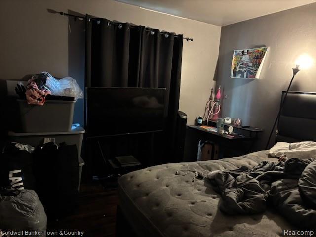 938 Barney Ave, Flint, MI 48503 - bedroom with wood finished floors