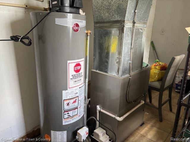 938 Barney Ave, Flint, MI 48503 - utilities featuring water heater and heating unit