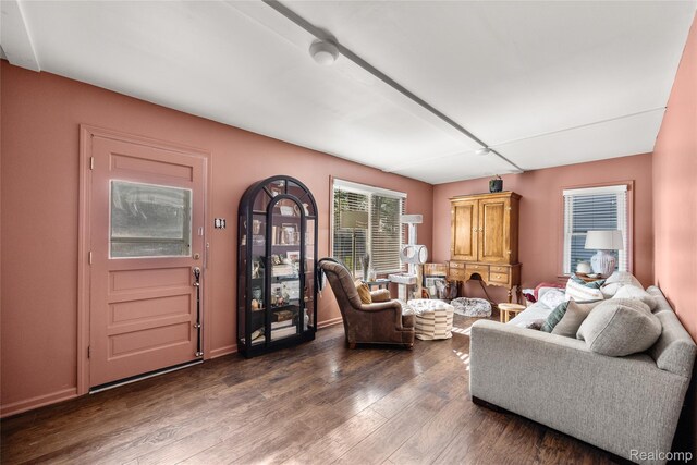27728 Larchmont St, Saint Clair Shores, MI 48081 - living area featuring dark wood-style floors and baseboards