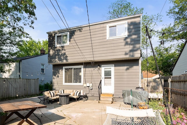 27728 Larchmont St, Saint Clair Shores, MI 48081 - back of property featuring an outdoor hangout area, a patio, a fenced backyard, and entry steps