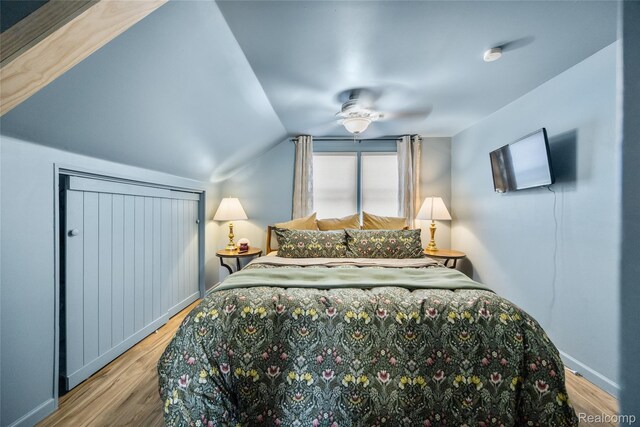 27728 Larchmont St, Saint Clair Shores, MI 48081 - bedroom featuring wood finished floors, lofted ceiling, and a ceiling fan