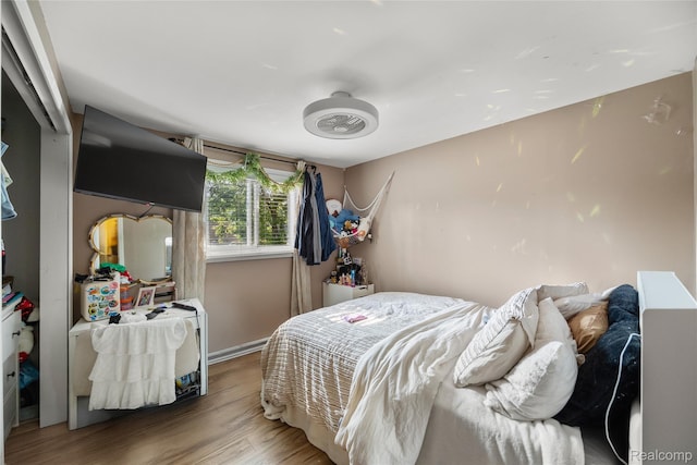 27728 Larchmont St, Saint Clair Shores, MI 48081 - bedroom featuring wood finished floors and baseboards
