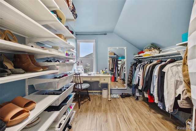 27728 Larchmont St, Saint Clair Shores, MI 48081 - spacious closet featuring vaulted ceiling and wood finished floors