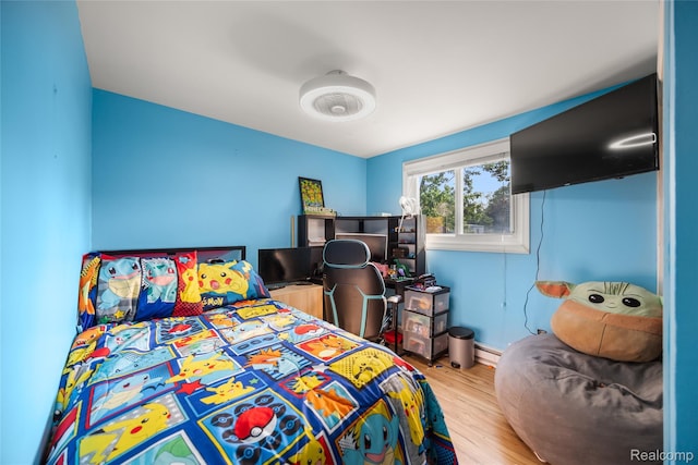 27728 Larchmont St, Saint Clair Shores, MI 48081 - bedroom featuring wood finished floors and baseboards